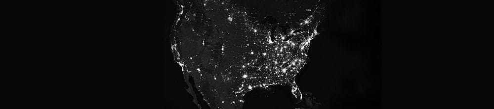 view of north America from above, at night, with cities lit up