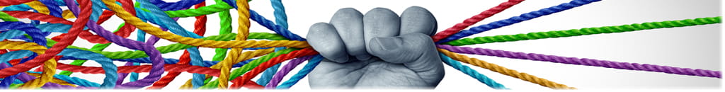 graphic of a hand holding multi-colored cords.