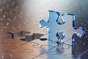 Detail graphic illustration of a glass puzzle piece about to fit into a larger puzzle